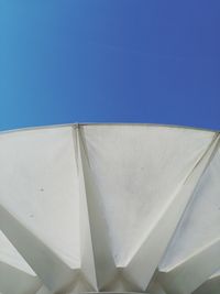 Low angle view of built structure against clear blue sky