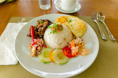 High angle view of meal served on table