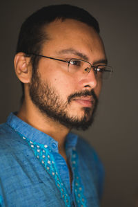 Portrait of young man looking away