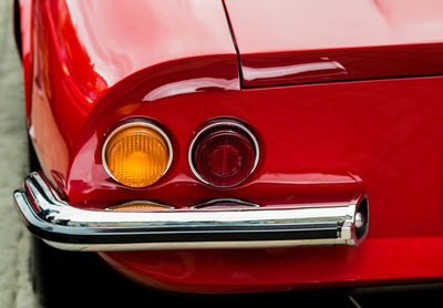 Close-up of red vintage car