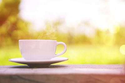 Close-up of coffee cup on table