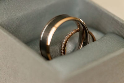 High angle view of wedding rings on table