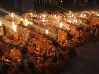 Close-up of illuminated lighting equipment at night