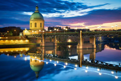 Reflection of illuminated buildings in canal