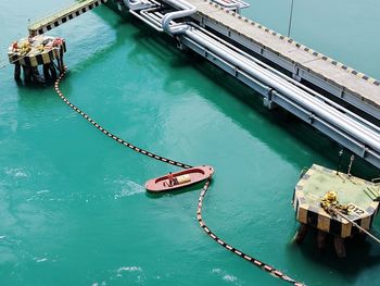 High angle view of ship moored in water