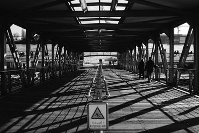 Shadow on walkway at bridge