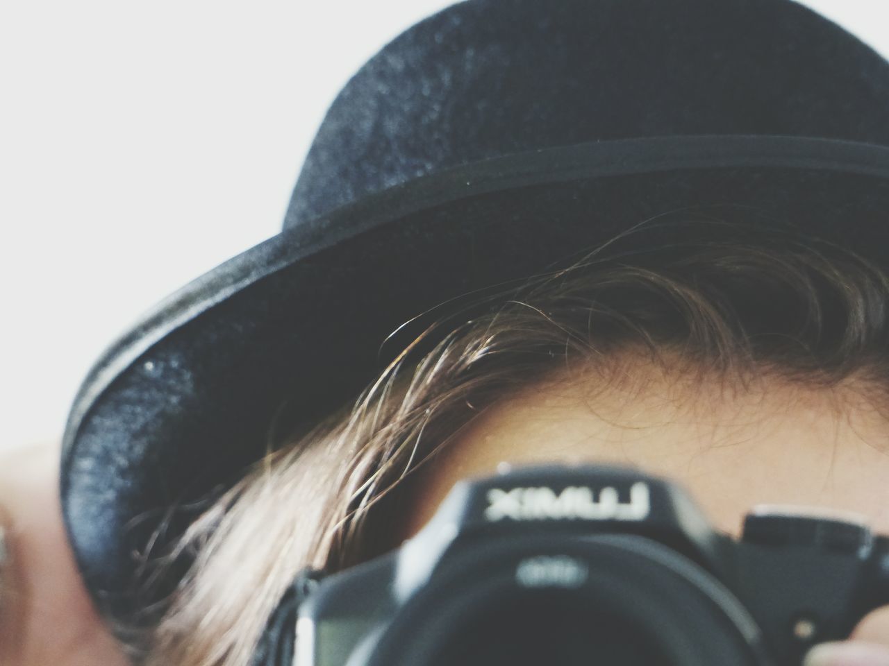 close-up, part of, lifestyles, cropped, headshot, studio shot, white background, focus on foreground, person, photography themes, unrecognizable person, leisure activity, holding, personal perspective, men, camera - photographic equipment, copy space