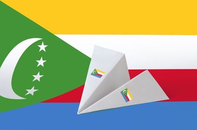 High angle view of paper flags against white background