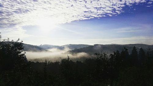 Scenic view of landscape against sky during sunset