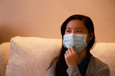 Portrait of woman wearing mask