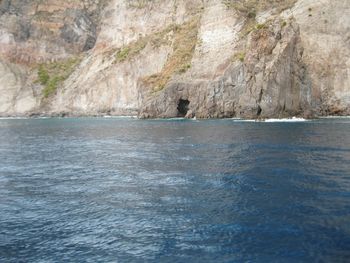 Scenic view of sea and rock formation