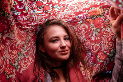 Close-up portrait of woman wearing scarf