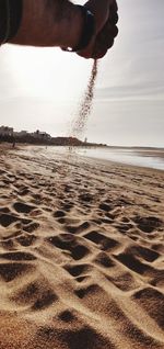 Low section of person on beach
