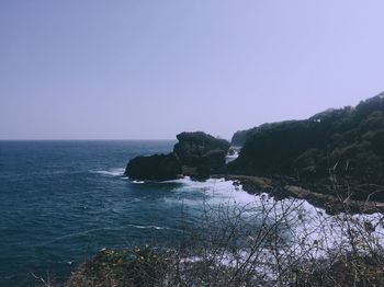 Scenic view of sea against clear sky