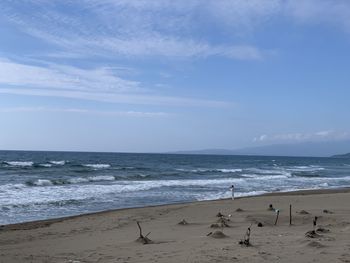 Scenic view of beach against sky