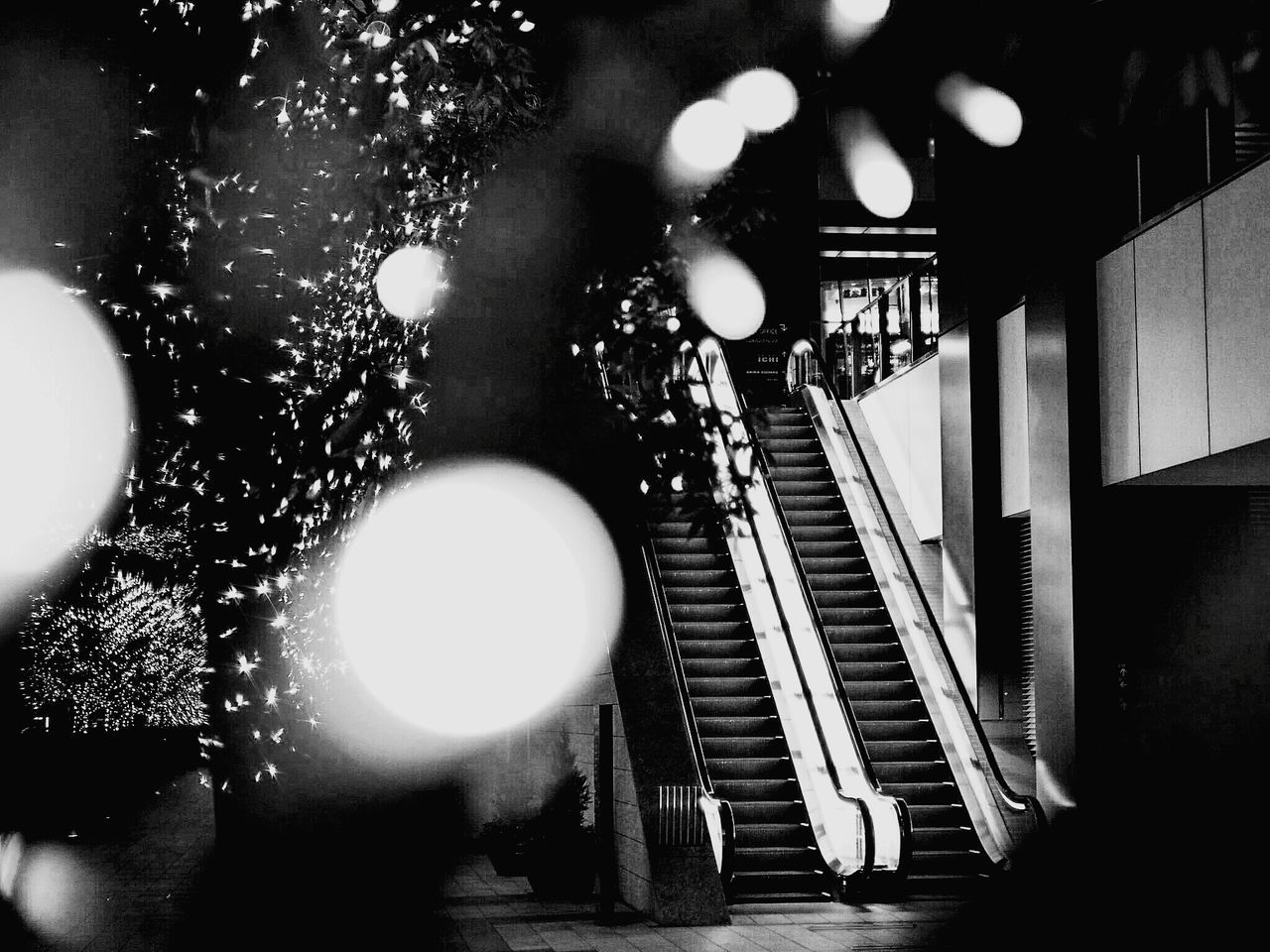 indoors, low angle view, illuminated, lighting equipment, no people, hanging, close-up, architecture, night