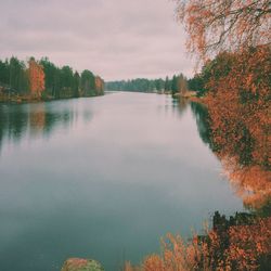 Scenic view of lake against sky during autumn