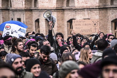 Group of people on street in city