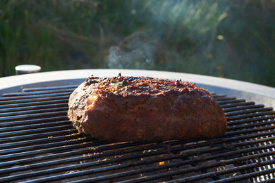 Close-up of meat on barbecue grill