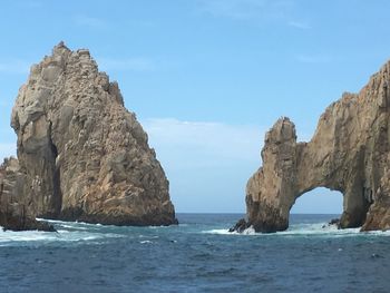 Scenic view of sea against blue sky