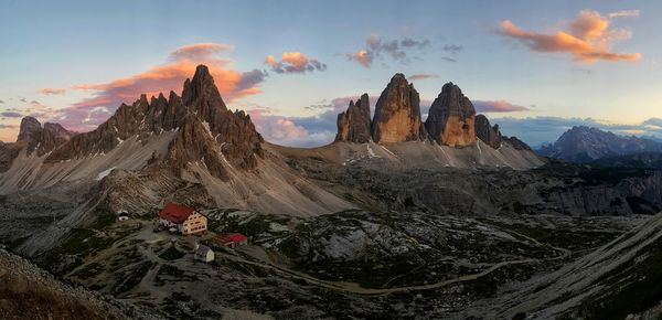 Panoramic view of mountain range against sky during sunset