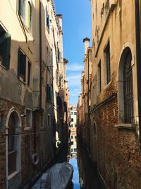 Alley amidst residential buildings