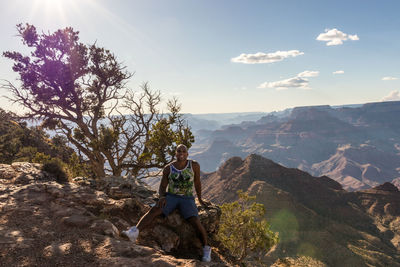Scenic view of tree mountains against sky