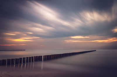 Scenic view of sea at sunset