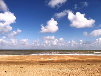 Scenic view of beach against sky