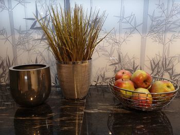 Fruits in basket on table