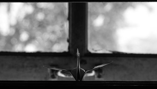 Close-up of glass window on table