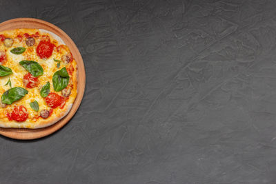 High angle view of pizza on table