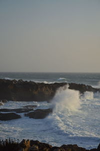 Scenic view of sea against clear sky
