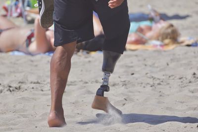 Man with disability on beach