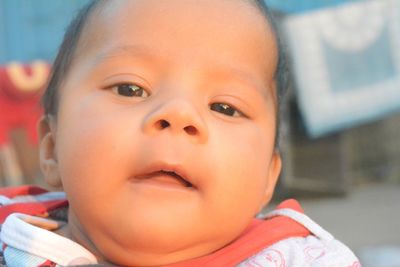 Close-up portrait of cute baby girl