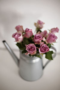 High angle view of pink roses on table