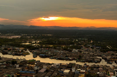 High angle view of townscape against sky during sunset