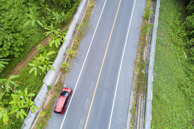 High angle view of man cycling on road