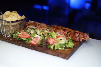 Close-up of food served on table