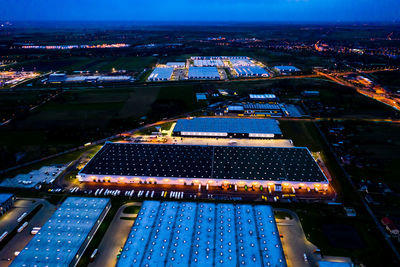 High angle view of illuminated buildings in city