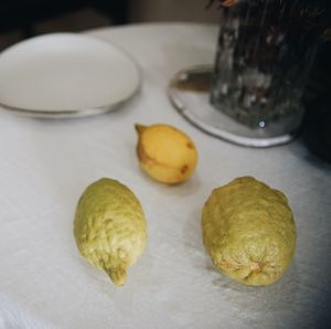 High angle view of fruits in plate on table