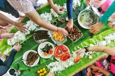 High angle view of people having food