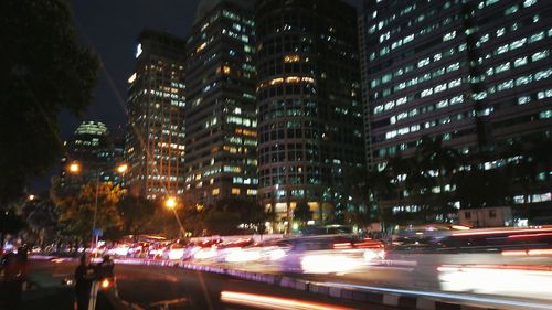 Traffic on city street at night