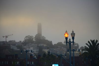 Buildings in city against sky