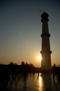 Silhouette of tower during sunset