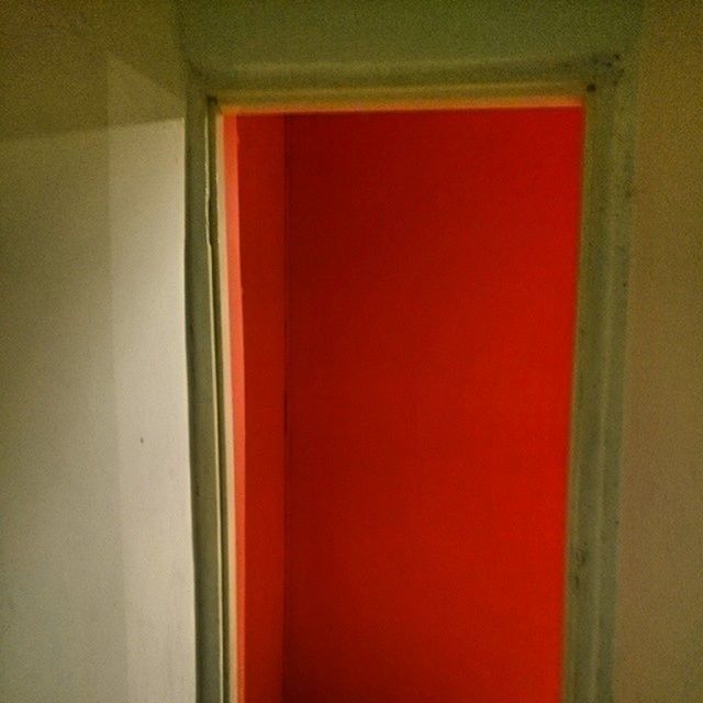 indoors, red, door, built structure, closed, house, architecture, wall - building feature, window, wall, curtain, home interior, no people, pattern, entrance, day, close-up, simplicity, doorway, white color
