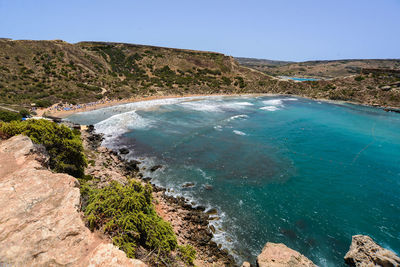 Scenic view of landscape against clear blue sky