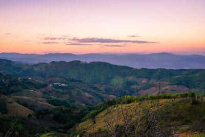 Scenic view of landscape against sky during sunset