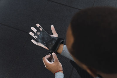 Athlete wearing strap in gym