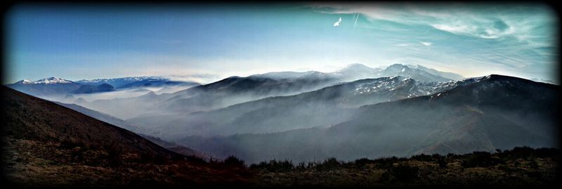 Scenic view of mountains against sky